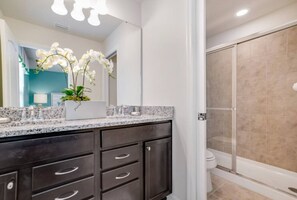 Combined shower/tub, hair dryer