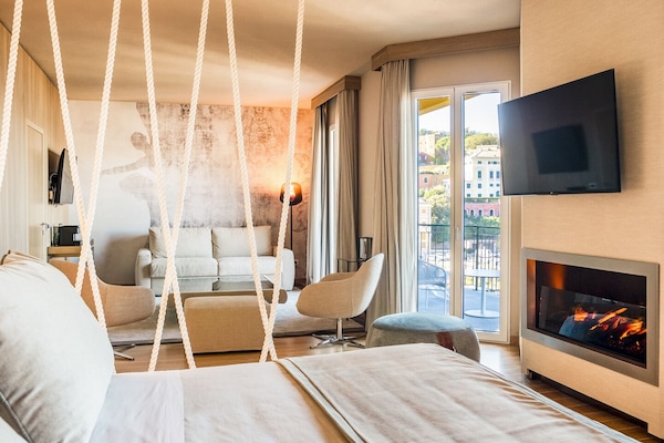 One-bedroom Suite Luxury with Balcony sea view on the Baia delle Favole | Private kitchen | Espresso maker, coffee/tea maker, electric kettle