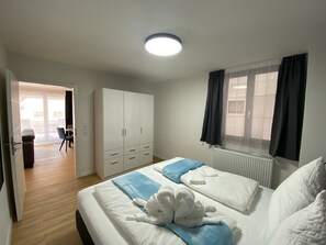 Design Apartment | Down comforters, individually decorated, individually furnished