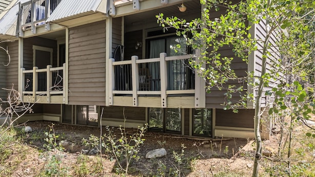 A multi-story building with balconies and a garden area. - Cozy Breckenridge Condo Near Peak 9 & Main Street (Breckenridge)