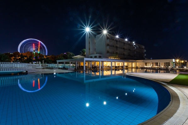 Outdoor pool, open 10:00 AM to 6:00 PM, pool umbrellas, sun loungers