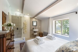 Bathtub, hair dryer, towels