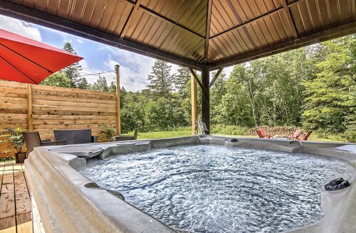 Large modern and comfortable cottage with private hot tub and wood stove. 