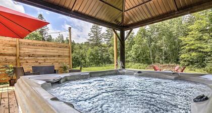 Large modern and comfortable cottage with private hot tub and wood stove.
