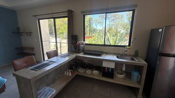 Fridge, microwave, stovetop, coffee/tea maker