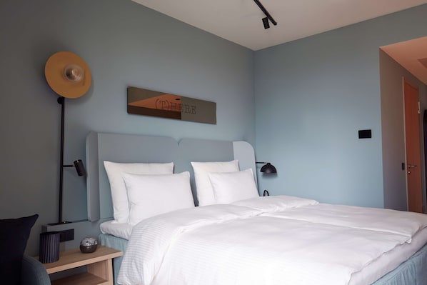 Hypo-allergenic bedding, in-room safe, desk, laptop workspace