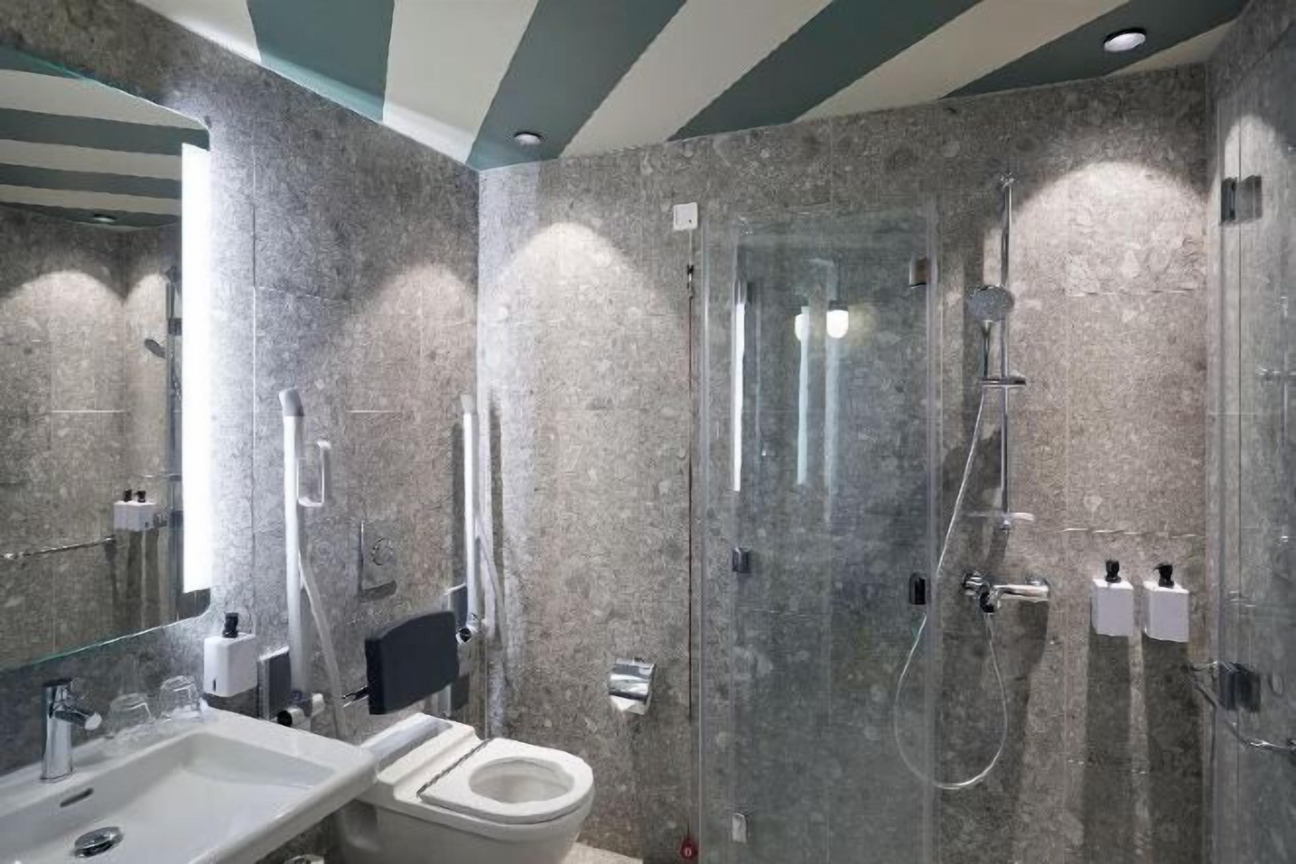 Bathroom | Shower, eco-friendly toiletries, hair dryer, towels