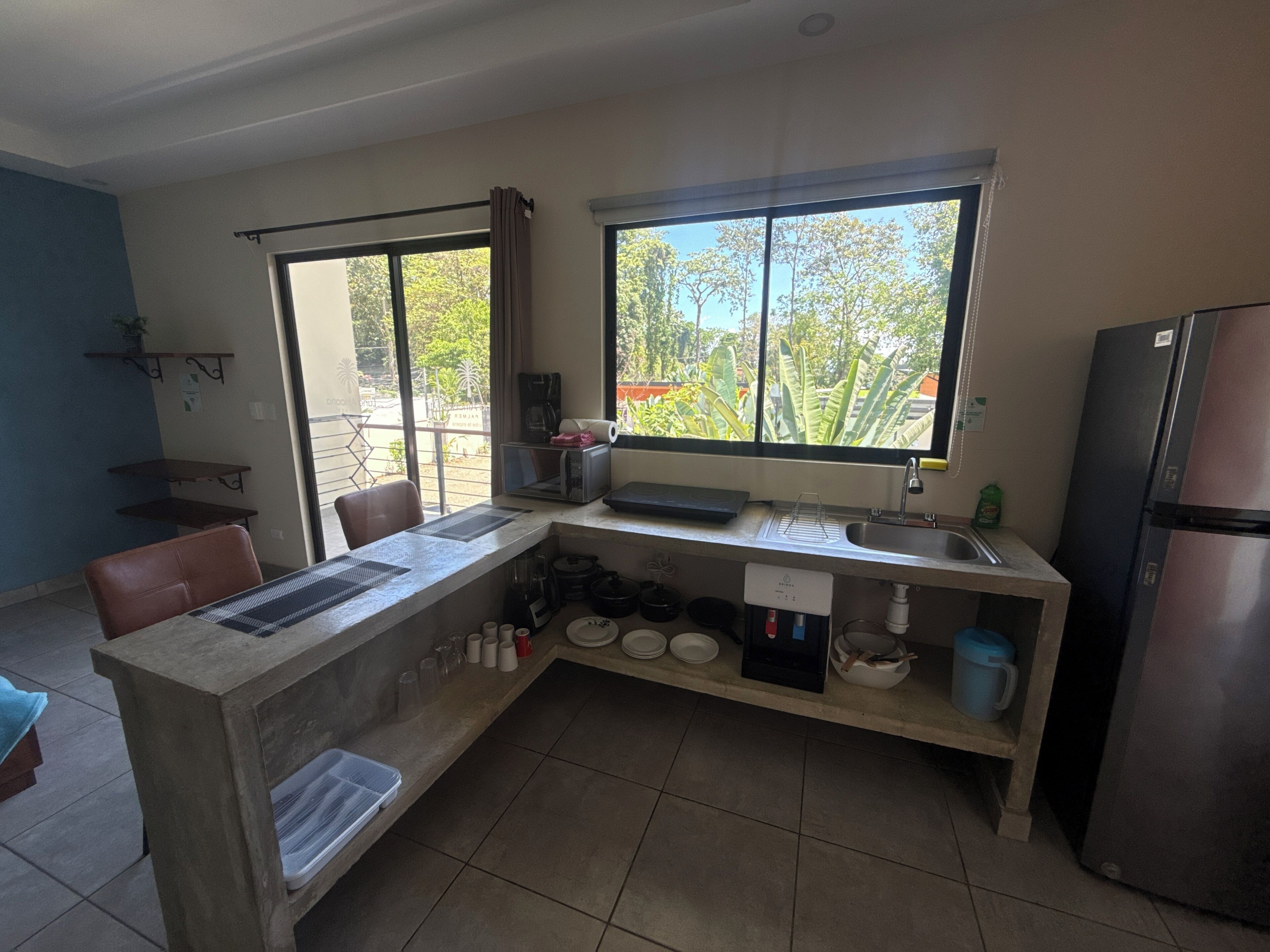 Fridge, microwave, stovetop, coffee/tea maker