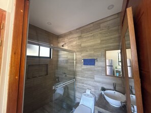 Shower, towels, soap, toilet paper