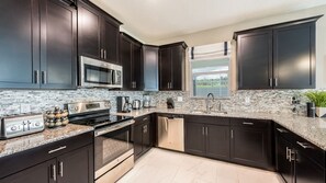 Fridge, microwave, dishwasher, coffee/tea maker