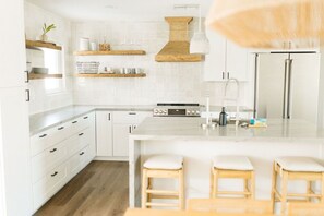 Enjoy casual dining at the central island with stools.