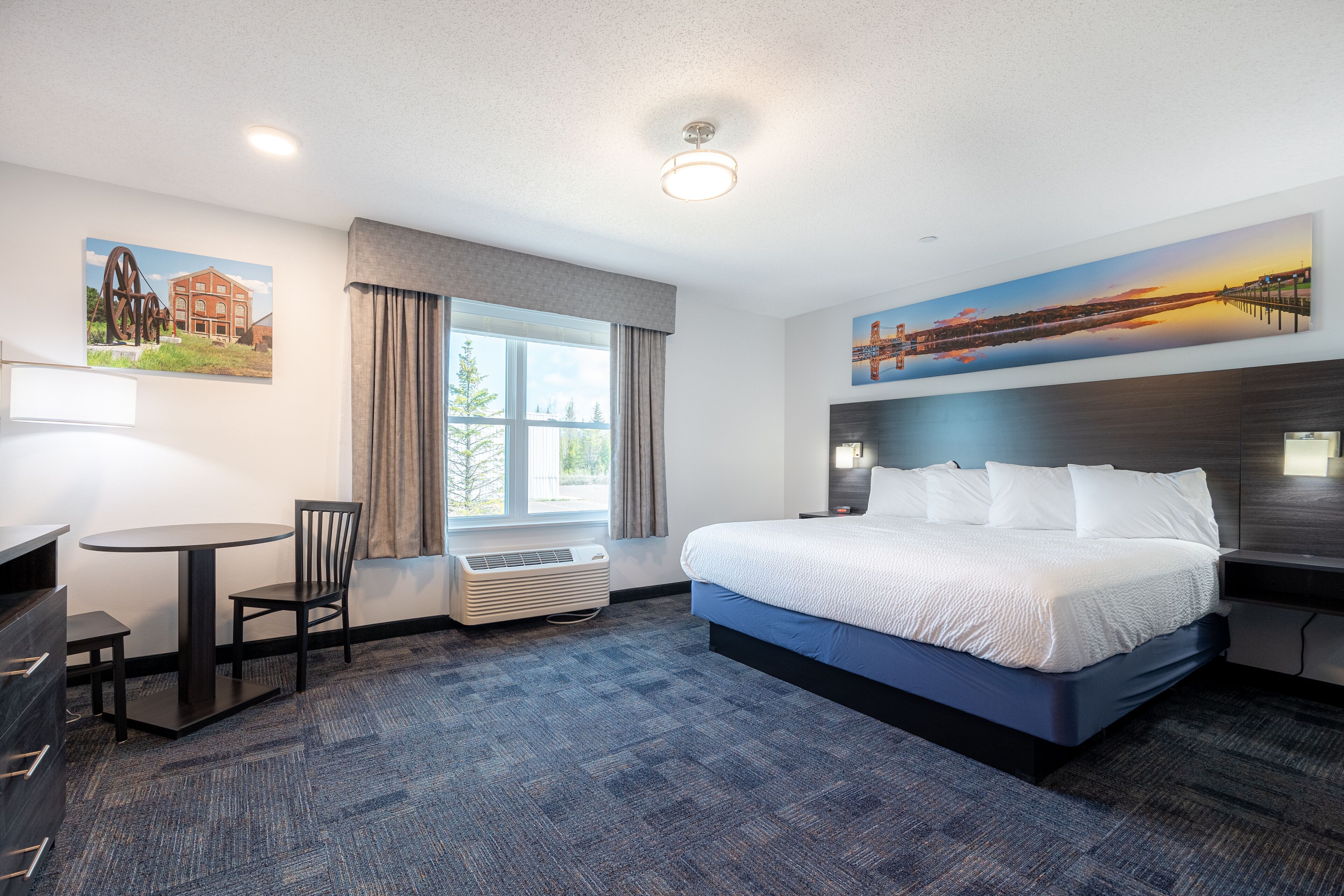 comfort room | 1 bedroom, desk, laptop workspace, iron/ironing board