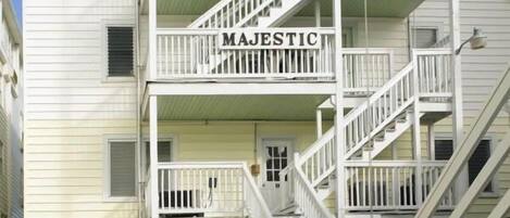 A multi-story building with a prominent "MAJESTIC" sign on the second floor.
