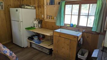 Fridge, coffee/tea maker, toaster, cookware/dishes/utensils