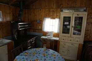 Fridge, coffee/tea maker, toaster, cookware/dishes/utensils