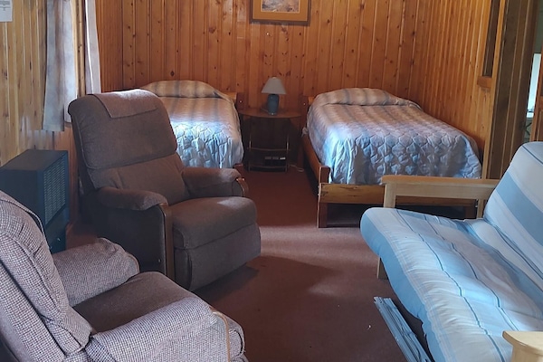 Cabin 11 features two twin beds and a futon.