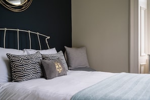 Desk, iron/ironing board, travel crib, WiFi (free)