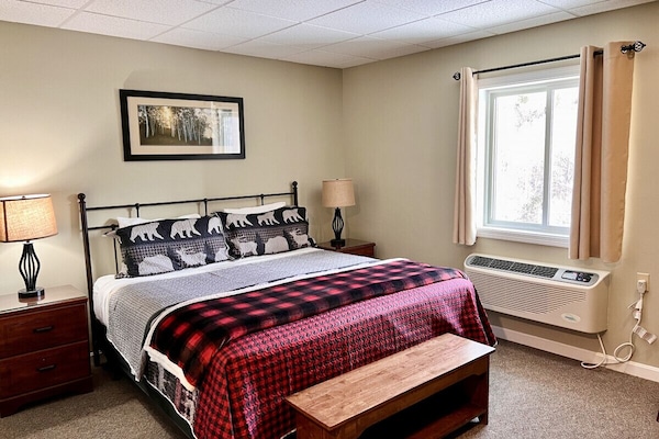 Sleep well in our comfy King Bed while enjoying the Mountain View!