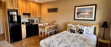 1 bedroom, desk, iron/ironing board, travel crib