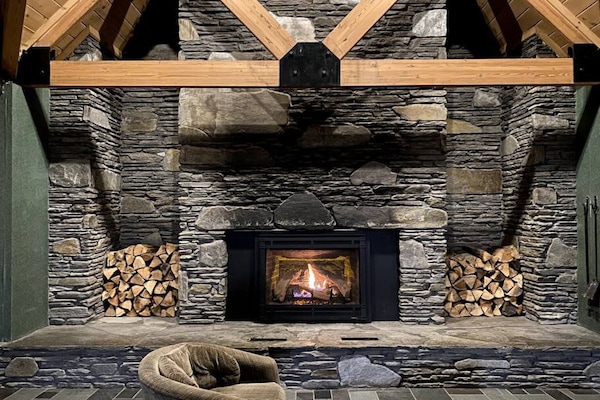 Relax and enjoy a cozy fire our Great room with gorgeous ambiance