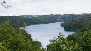 A river surrounded by dense forest and hills. - Quietly located vacation apartment in Reichshof Eckenhagen (Reichshof)