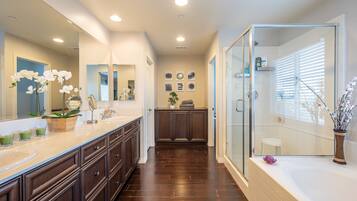 Combined shower/bathtub, hair dryer, towels, soap