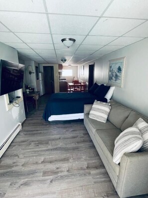 Deluxe-Apartment, 2 Schlafzimmer, Poolblick | Wohnbereich