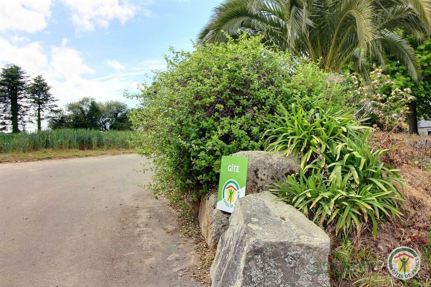 A sign with the text "GITE" and "GITES DE FRANCE" indicating a campsite.