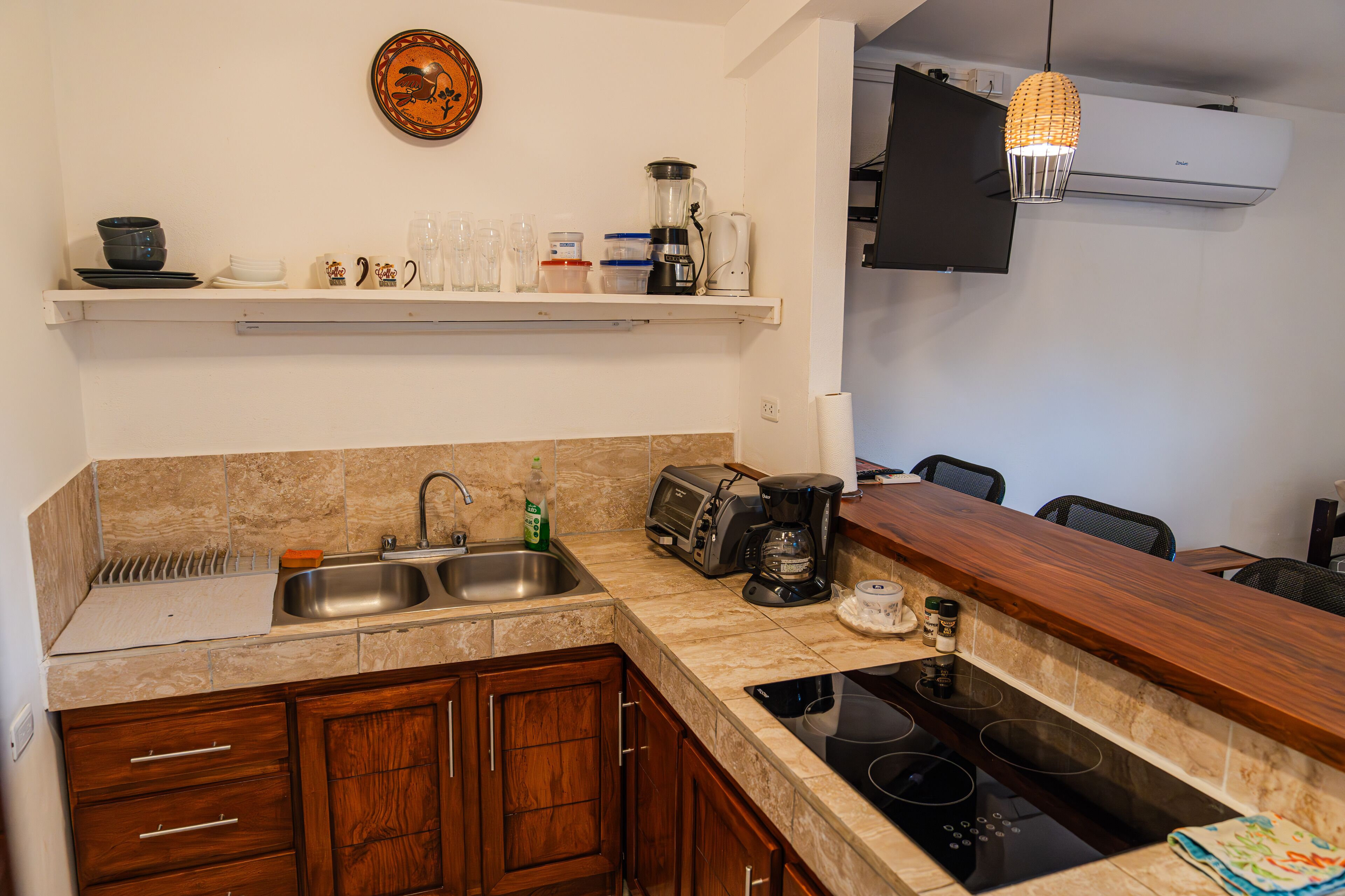 Fridge, microwave, stovetop, coffee/tea maker