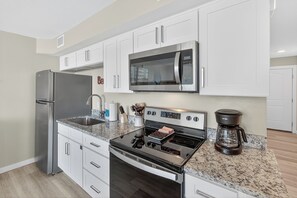 Fridge, microwave, oven, stovetop - Sandcastle Condominium Unit 326 (Port Aransas)