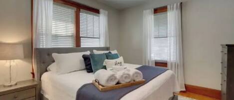 2 bedrooms, desk, iron/ironing board, travel crib