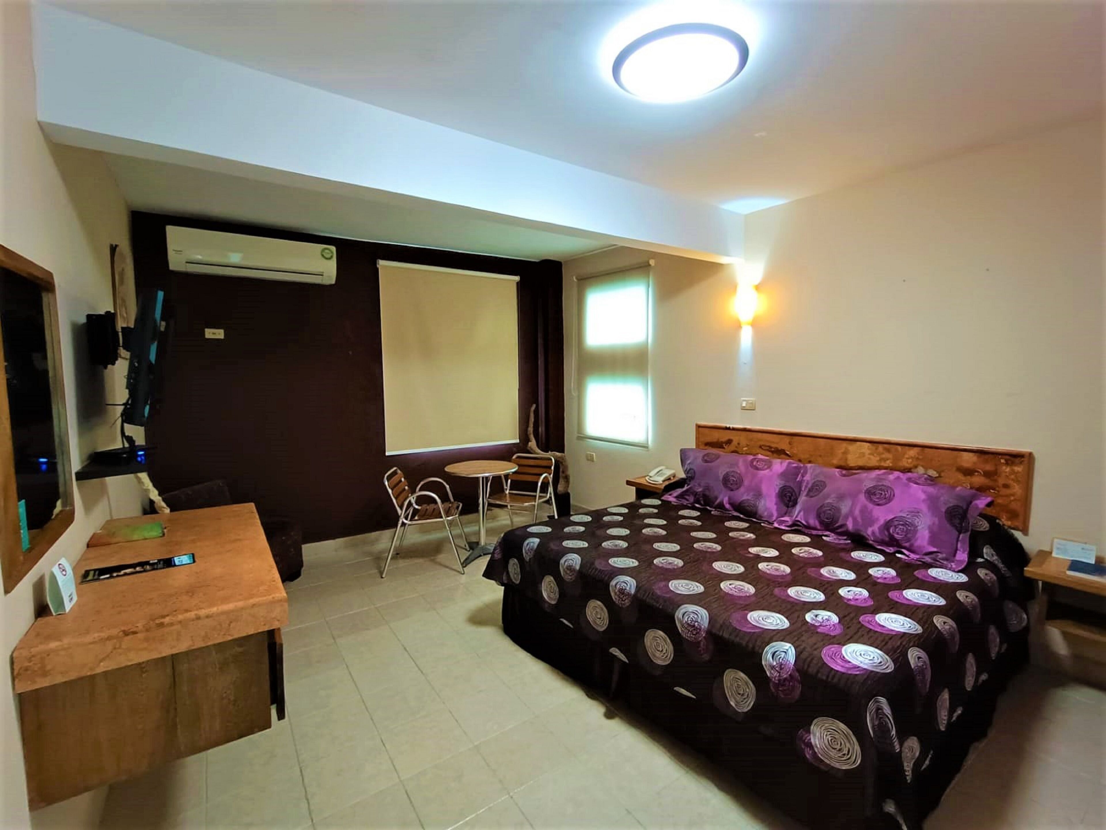 Blackout drapes, iron/ironing board, free WiFi, bed sheets