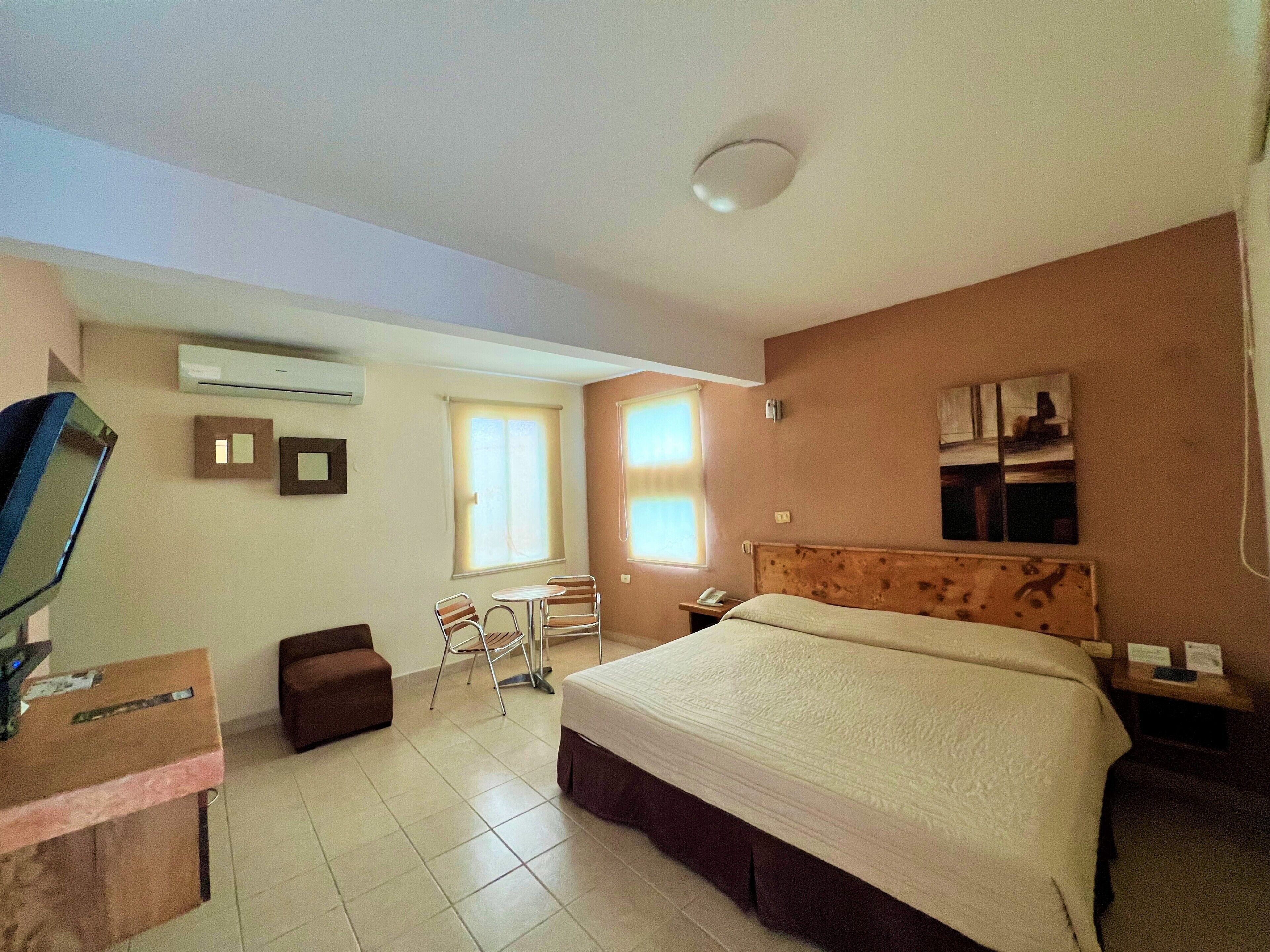Blackout drapes, iron/ironing board, free WiFi, bed sheets