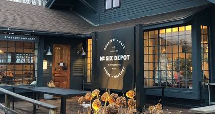 Fog Hill Cabin is a peaceful retreat set in a forest landscape. Stargazing Bliss