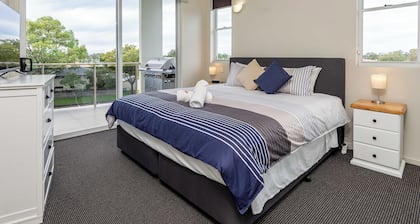 Awesome, modern, open-plan 3rd floor (with lift) unit with stunning water views.