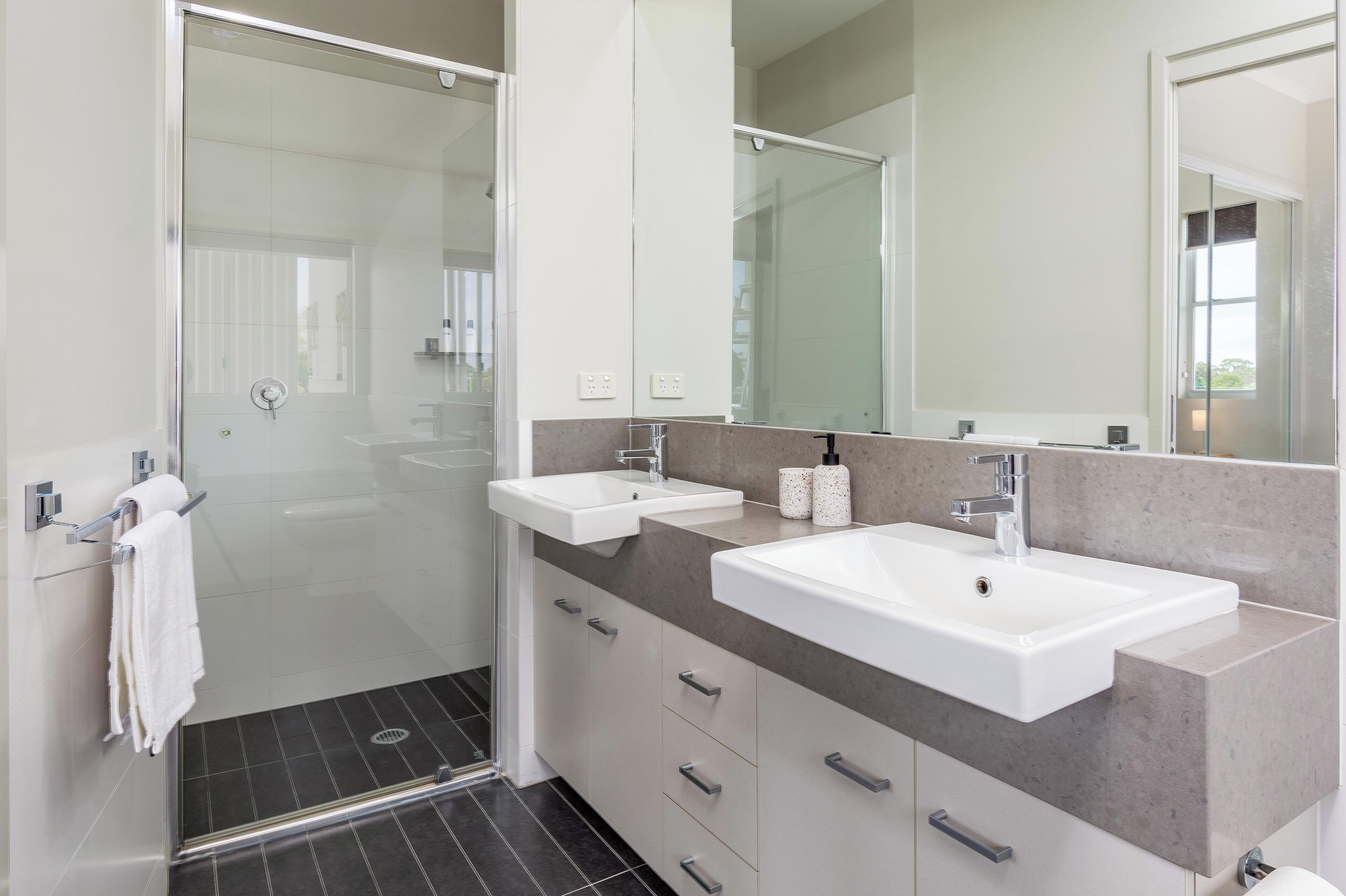 Shower, hair dryer, towels