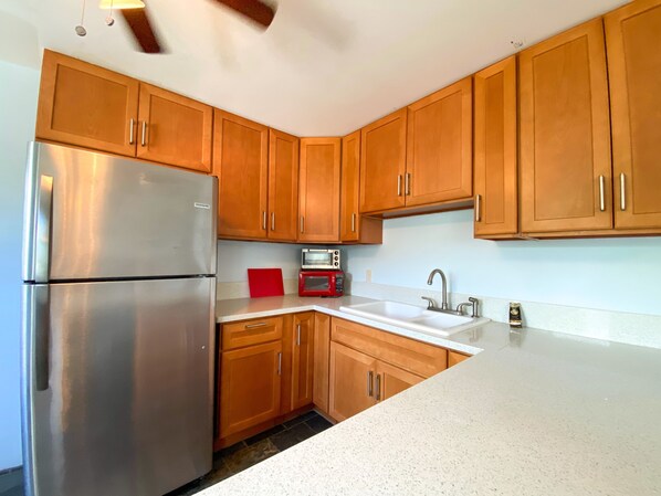 Fridge, microwave, stovetop, coffee/tea maker