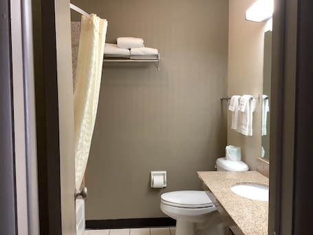 1 Queen Mini Suite Kitchenette (QQMA2) | Bathroom | Combined shower/tub, hair dryer, towels, soap. Silver Spur Vintage Inn & Suites
