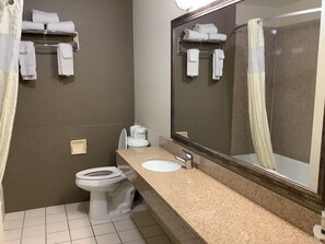 Combined shower/bathtub, hair dryer, towels, soap