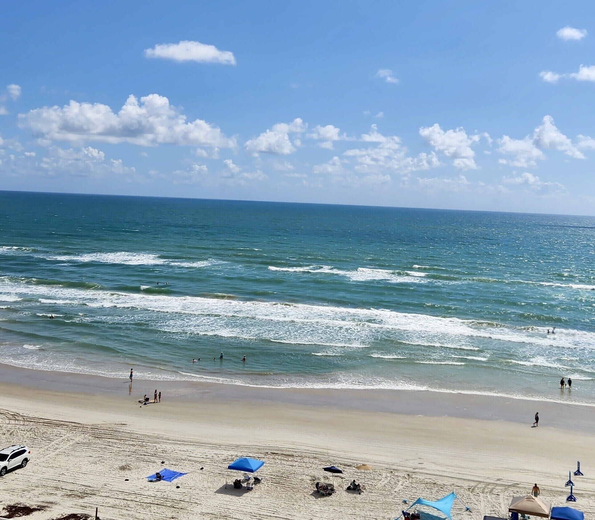 On the beach, sun-loungers, beach towels