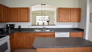 Fridge, microwave, oven, stovetop - Fabulous private pool home, conservation views, resort of Watersong! (Davenport)