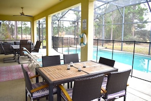 Outdoor dining - Fabulous private pool home, conservation views, resort of Watersong! (Davenport)