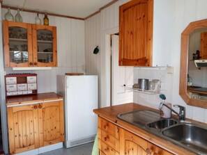 Fridge, microwave, toaster, cookware/dishes/utensils