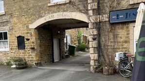 A stone building with a sign reading "JEN" and an archway labeled "JEN'S BAR." - Woodside Cottage Grewelthorpe Nr Masham Ripon (Ripon)
