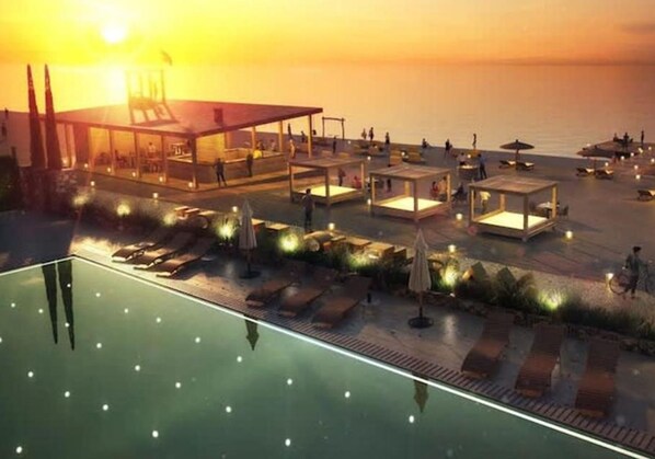 Playa privada, arena negra