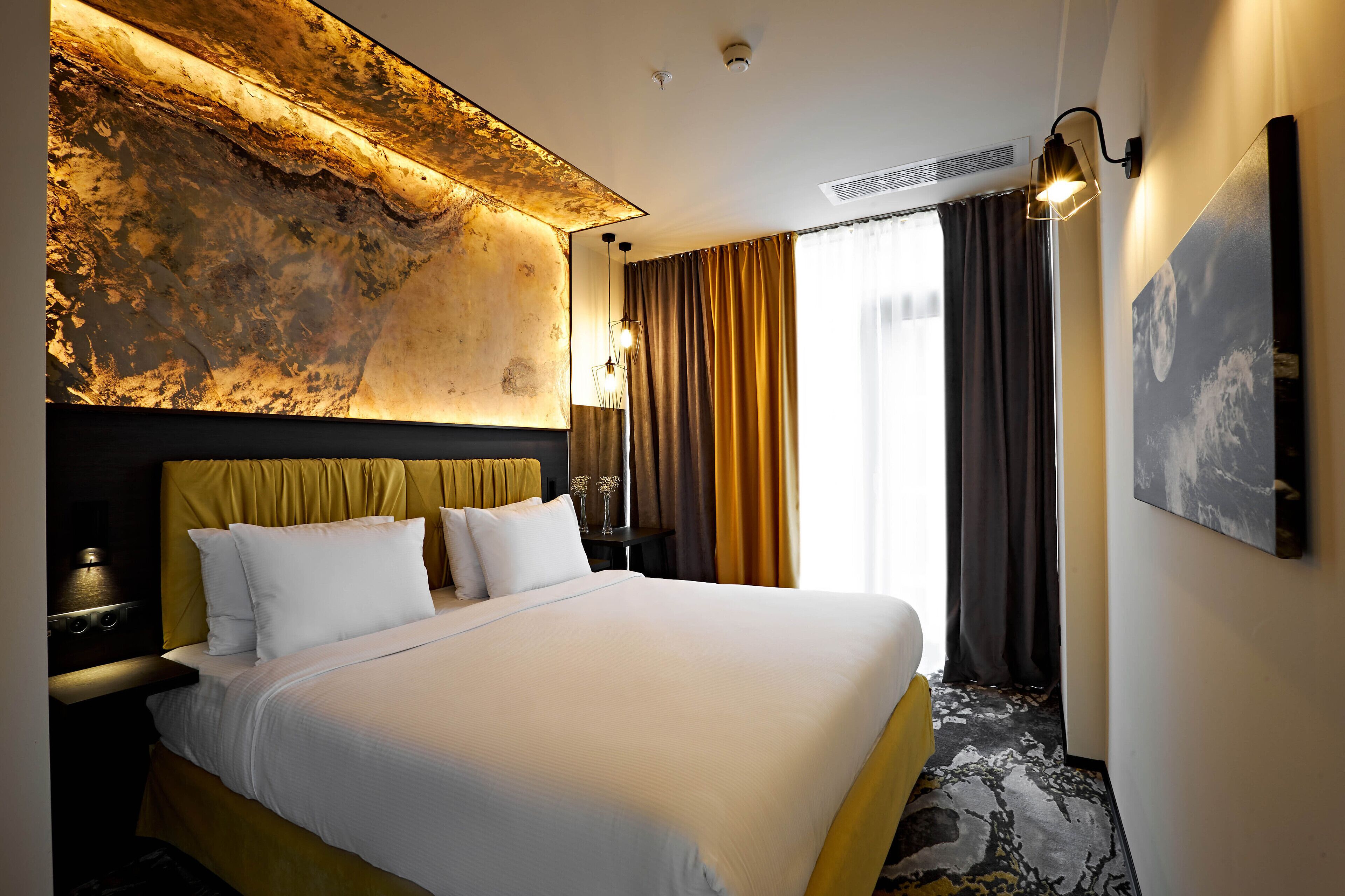 Premium-suite - tekøkken - havudsigt | Senge med topmadrasser, pengeskab på værelset, individuelt design