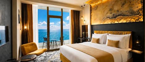 Suite Prestige, cuisinette, vue sur la mer | Lit avec matelas à plateau-coussin, coffre-fort, décor unique