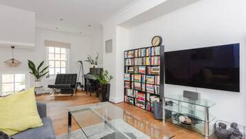 Basic House, Multiple Beds | Living room | TV