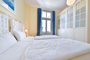 2 عدّة غرف نوم ومكواة/لوح كي وواي فاي مجانًا وملاءات أسرّة