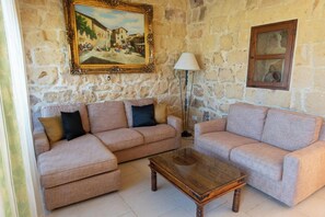 Standard Villa, Multiple Bedrooms (Villeleynah Amazing Gozitan Villa +) | Living area | 21-inch Smart TV with digital channels, TV, fireplace -  Villeleynah Amazing Gozitan Villa + Pool (Munxar)